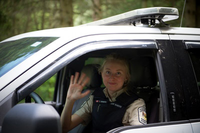 Warden in patrol car