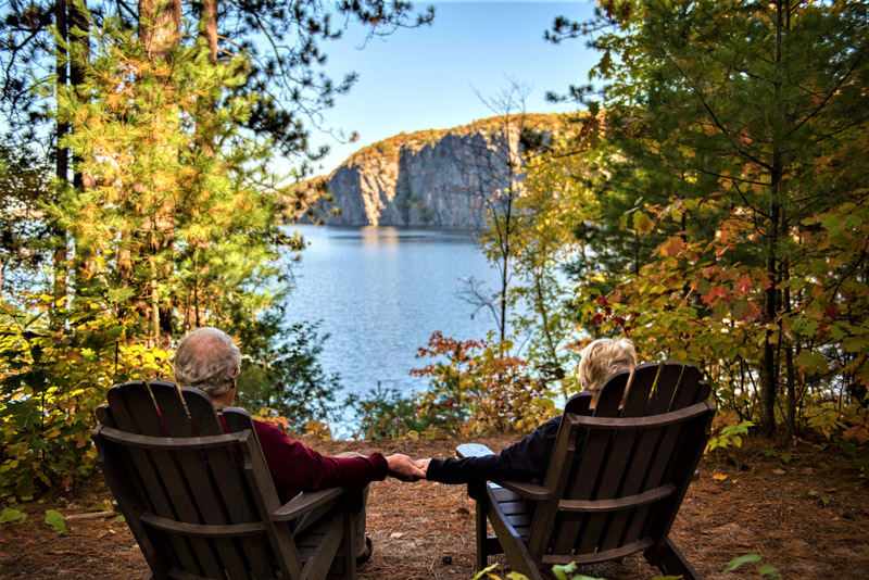 People in chairs enjoying view