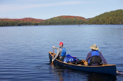 paddlers enjoy a quiet trip in the fall