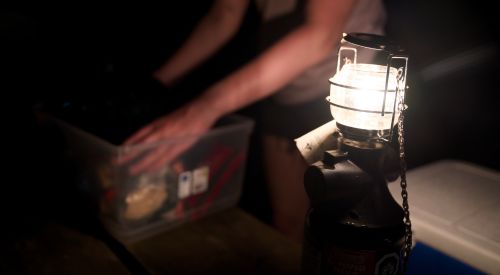lamp on picnic table at night