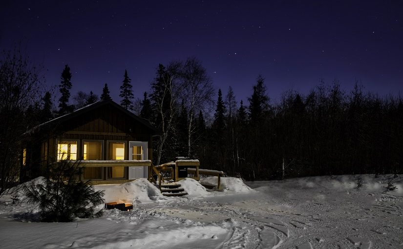 Winter cabin at night