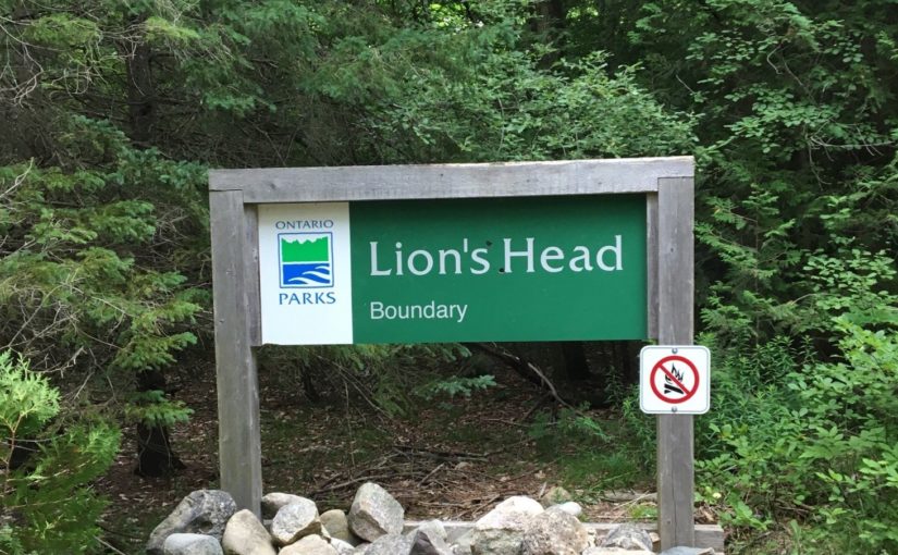 sign that says "Lion's Head Provincial Park" with a no-fires icon